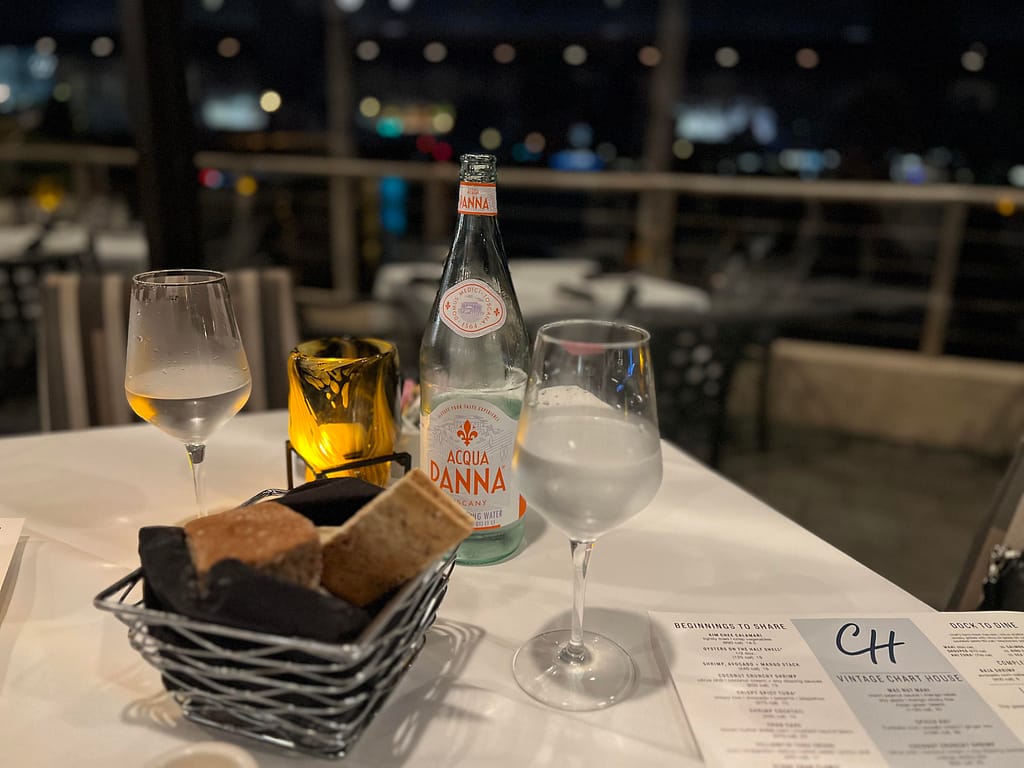 Sparkling water and bread basket