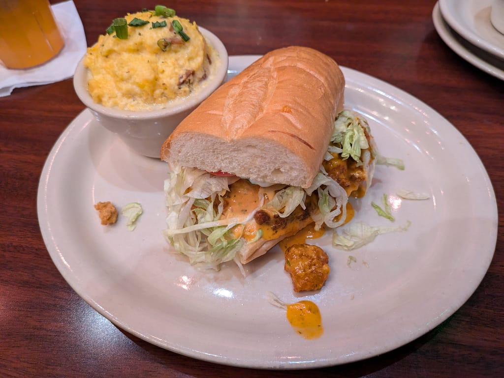 Tibby’s New Orleans Kitchen, Gator Po Boy and Andouille Cheddar Grits