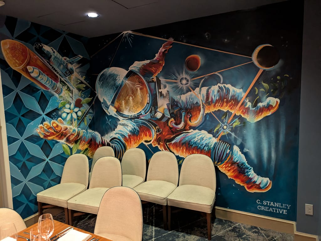 Astronaut in space mural in the Aurora restaurant