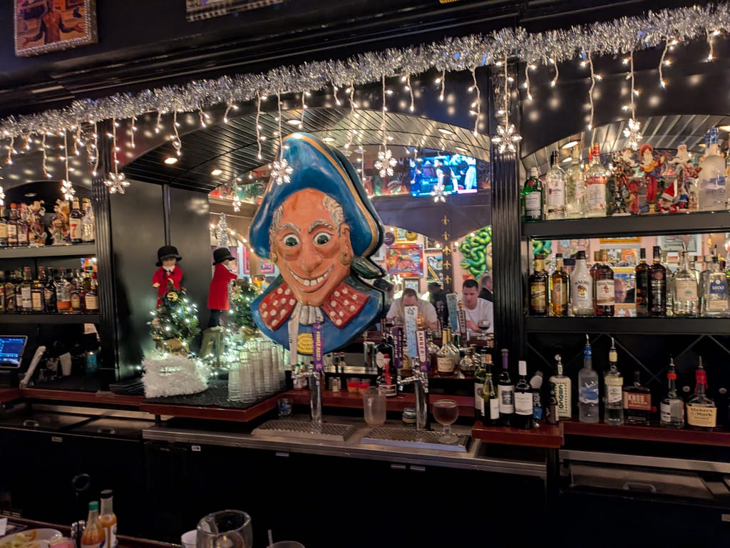 Mardi Gras New Orleans decor over the bar
