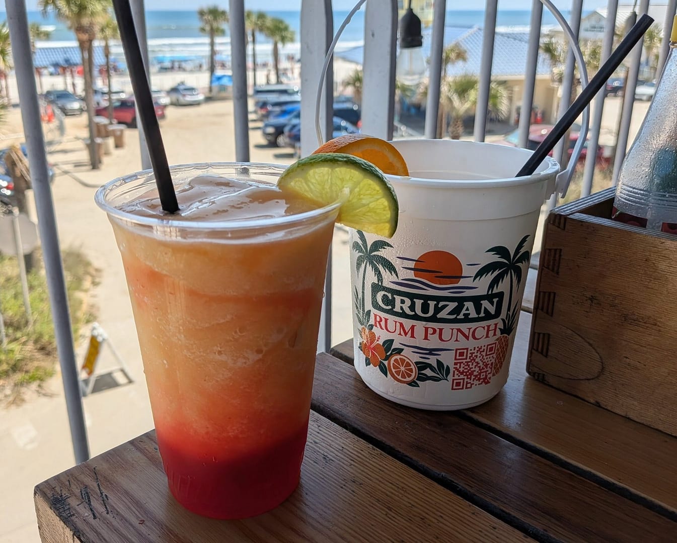 Frozen drinks at Crabby's Bar and Grill with a beach view