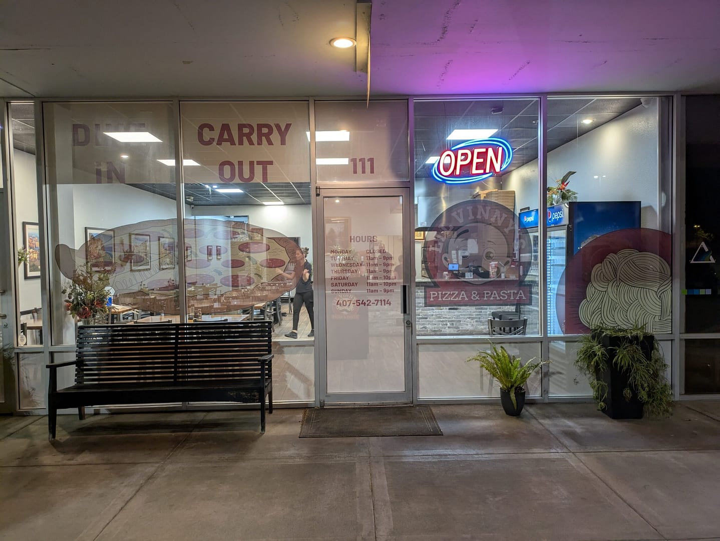Storefront of Lil Vinny's Pizza & Pasta in Oviedo with the Italian logo
