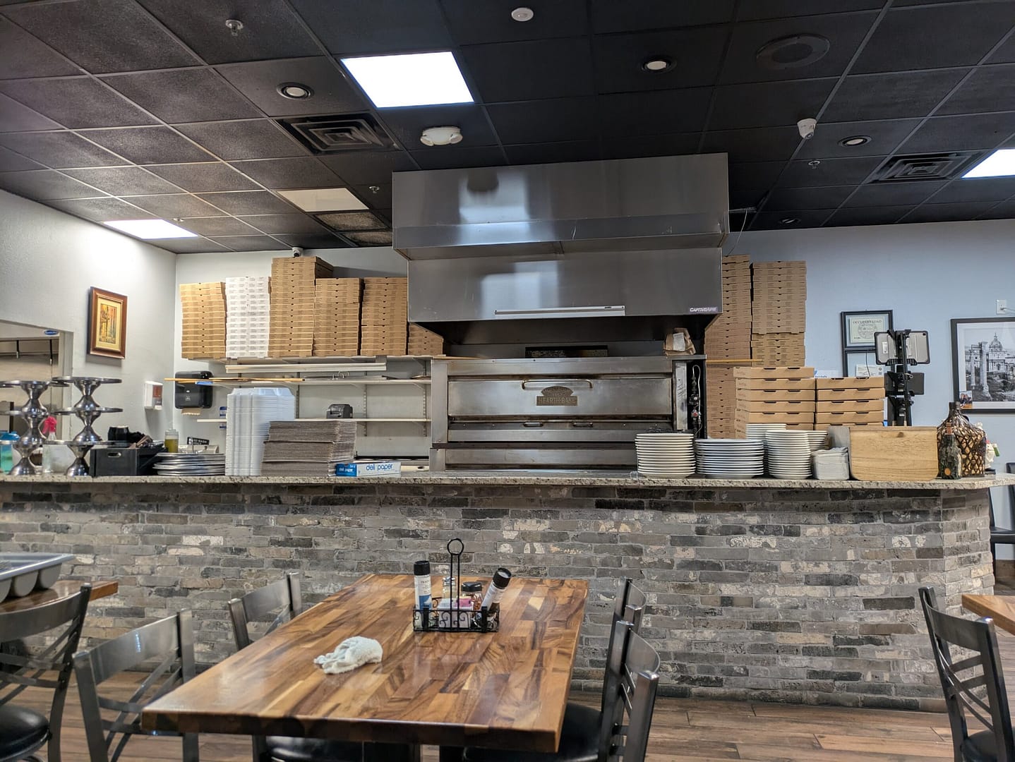 Open kitchen with pizza oven at Lil Vinny's Pizza & Pasta in Oviedo