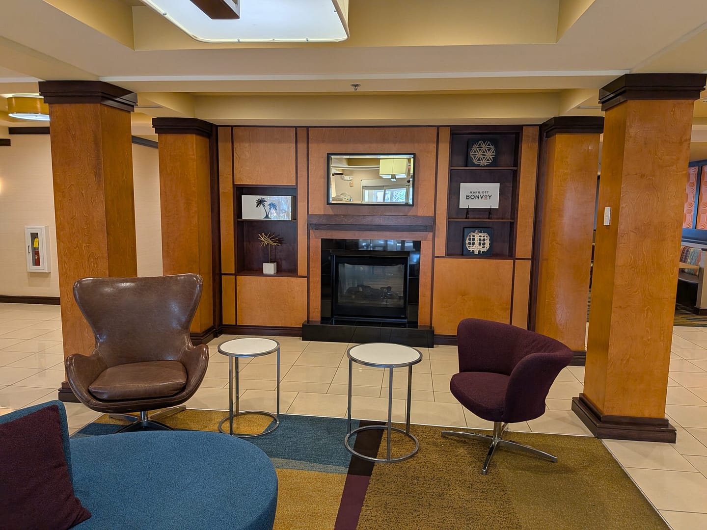 Lobby lounge with fireplace at Courtyard Titusville Kennedy Space Center