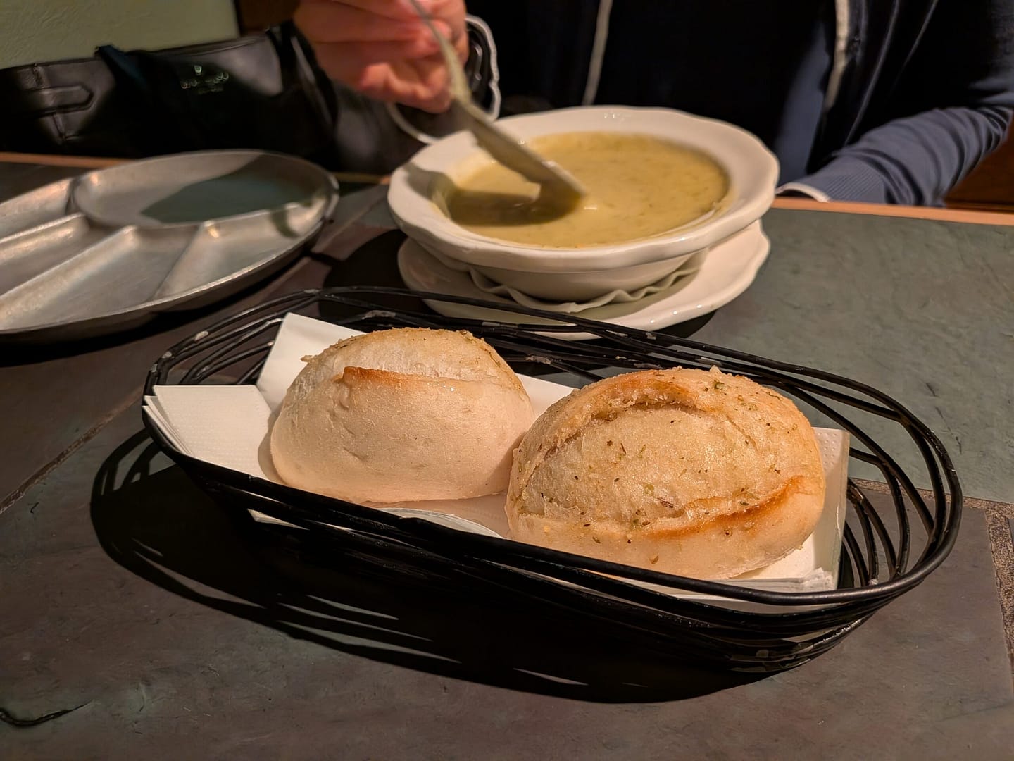 Soup and fresh bread rolls at Colorado Fondue Company