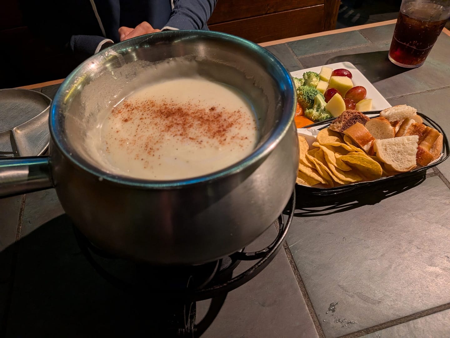 Cheese fondue pot with dippers at Colorado Fondue Company