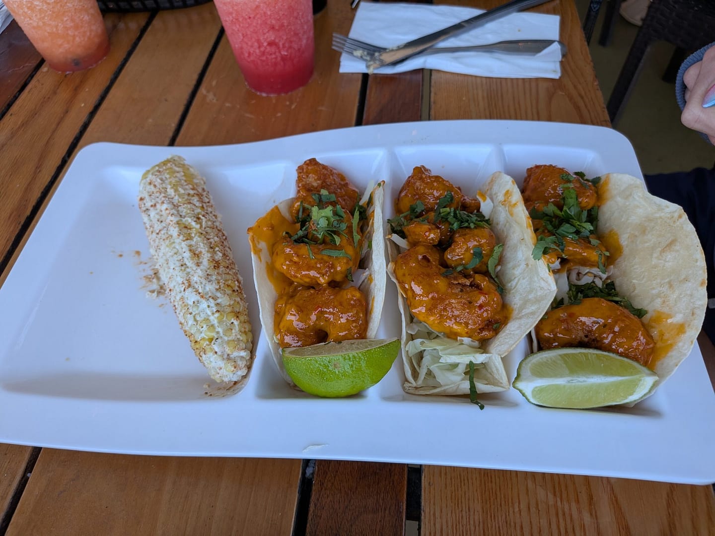 Bang bang shrimp tacos with Mexican street corn at Crabby's