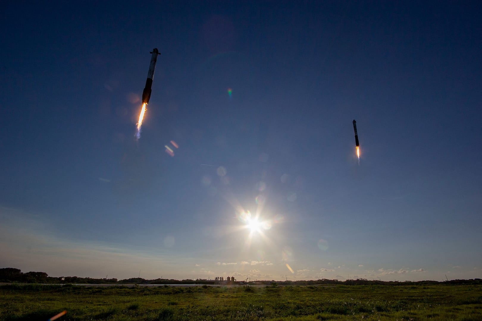 Two SpaceX boosters landing back at launch site near Jetty Park